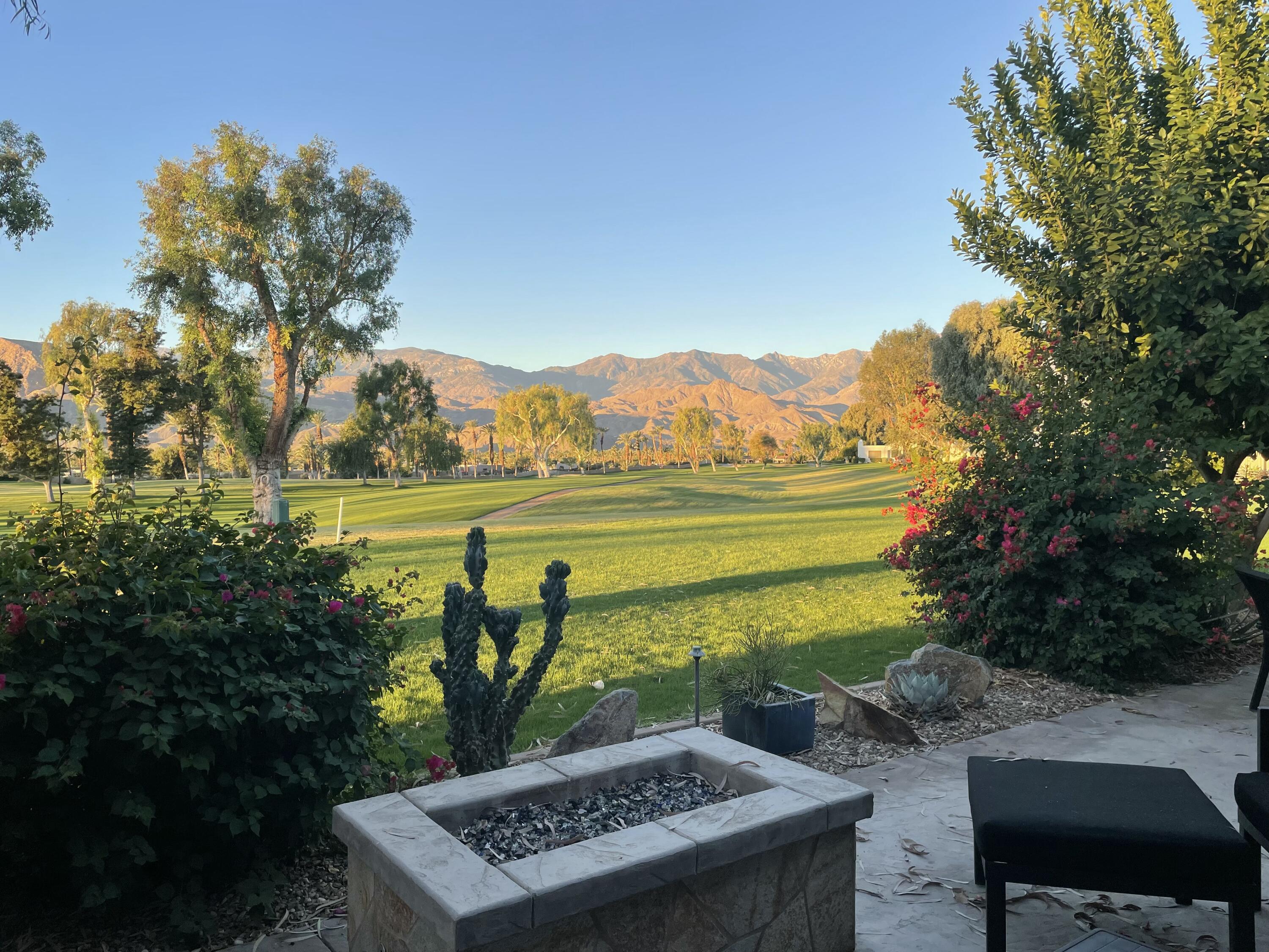 829 Inverness Drive Rancho Mirage, CA 92270 - Photo 7 of 27 a view of a lake with a mountain in the back