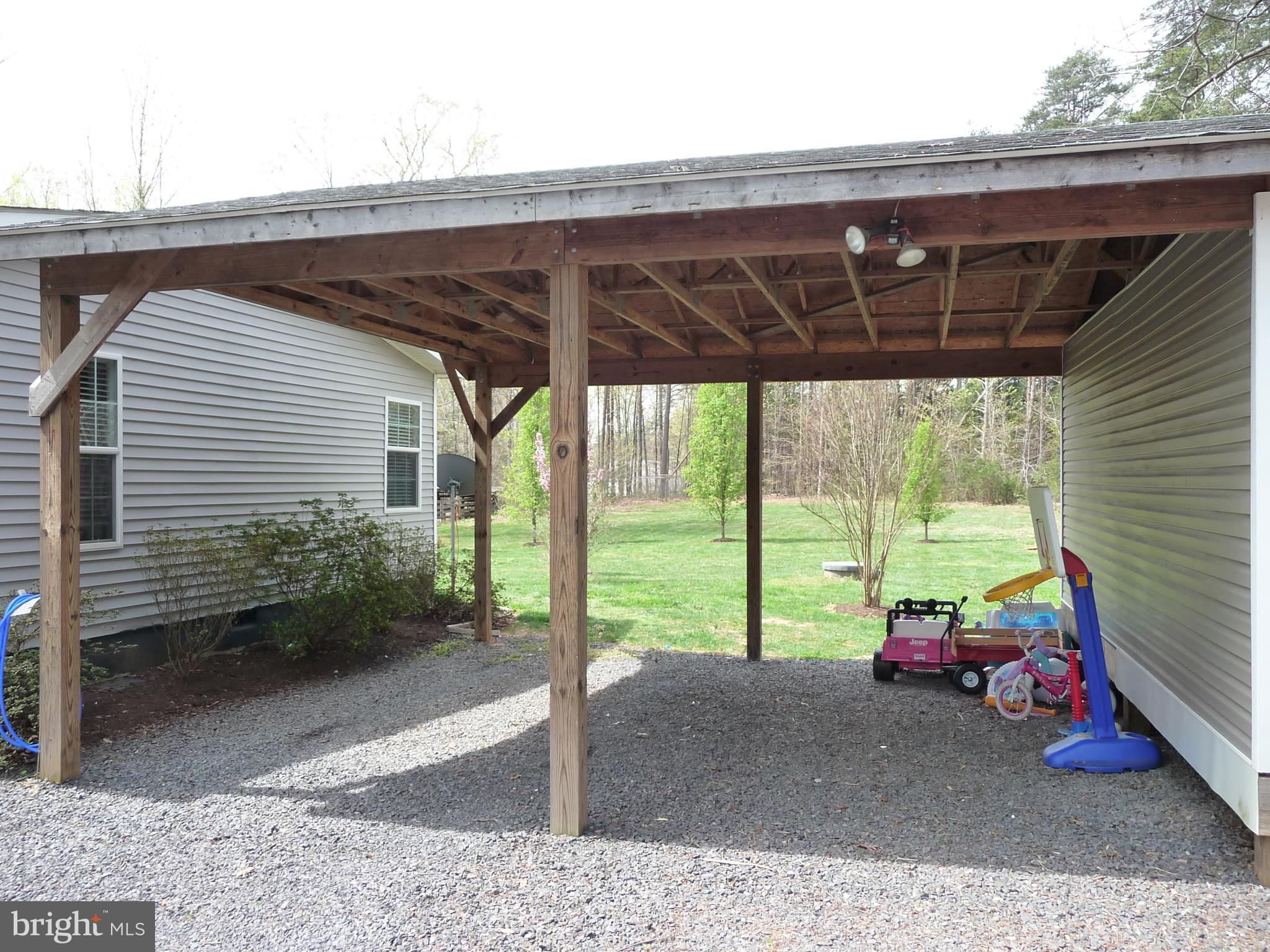 17026 Tysons Center Road Orange, VA 22960 - Photo 5 of 27 Carport with Storage closet