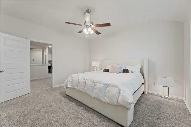 a bedroom with a bed and closet