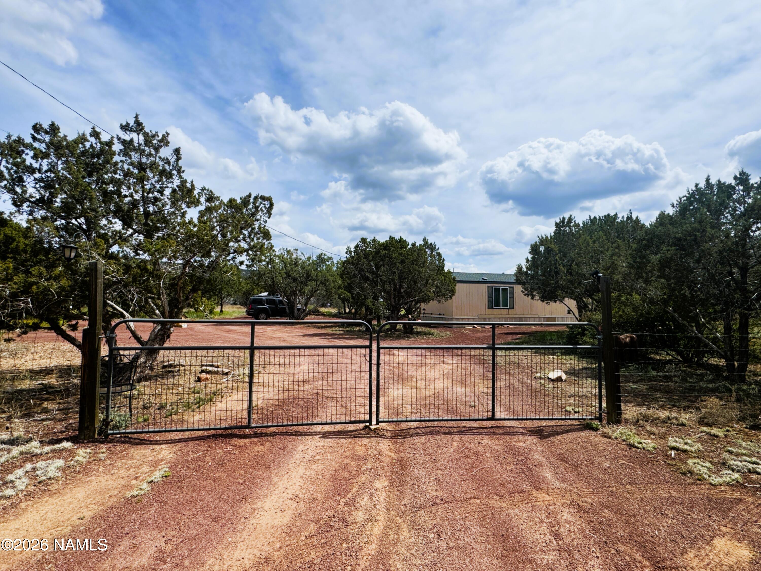 4399 Quarry Road Williams, AZ 86046 - Photo 2 of 13 front gate