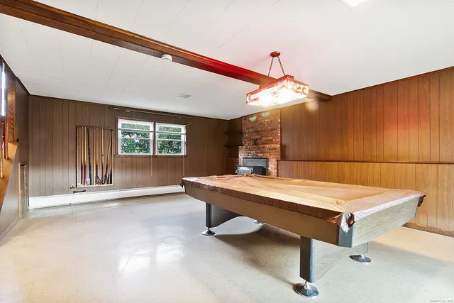 a room with a table and chairs