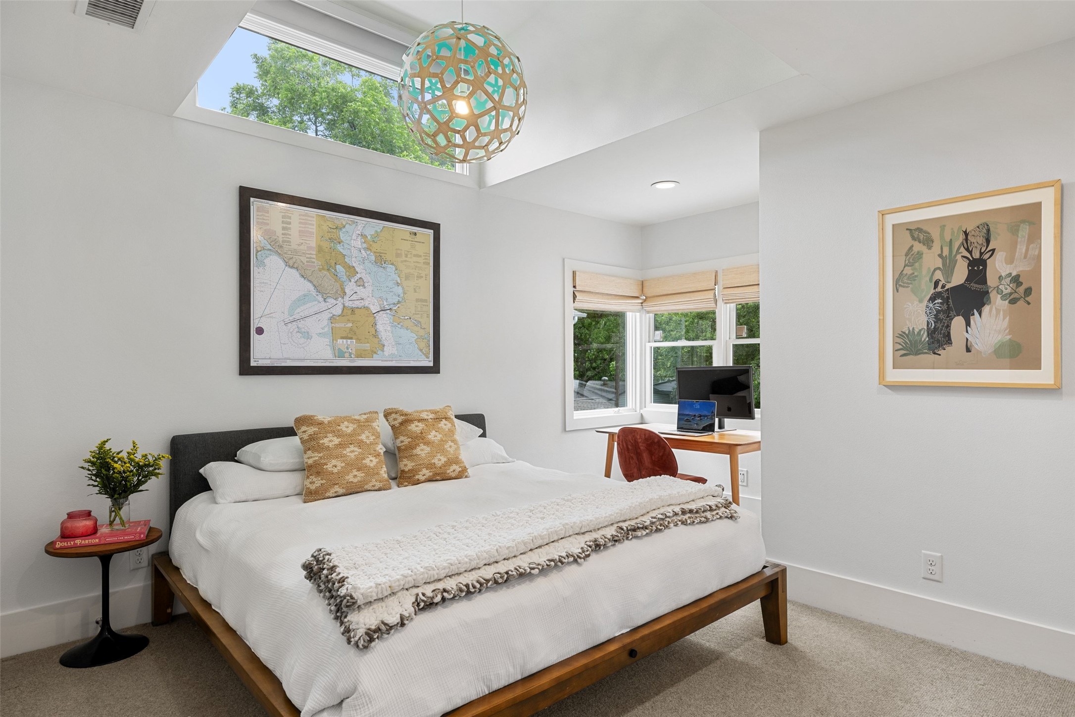 2000 Rundell Place Austin, TX 78704 - Photo 28 of 38 Natural light streams into this bedroom, featuring high ceilings and a dedicated workspace.