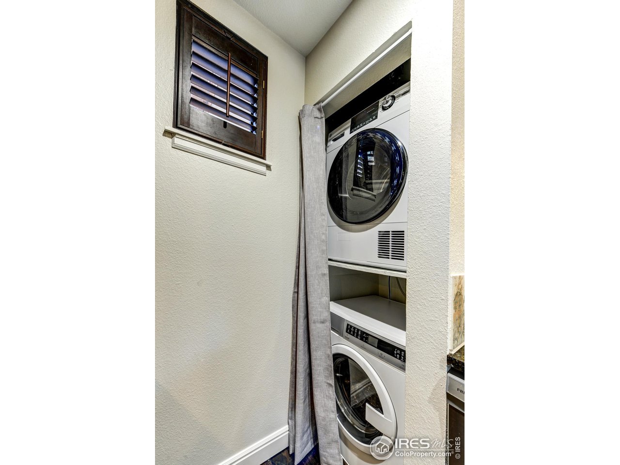3025 Broadway, Unit 8 Boulder, CO 80304 - Photo 11 of 16 a utility room with dryer and washer