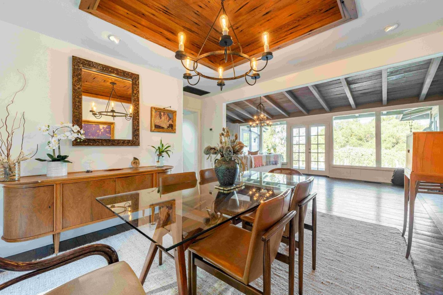 60 Los Ositos Road Carmel Valley, CA 93924 - Photo 11 of 47 a view of a dining room with furniture window and wooden floor