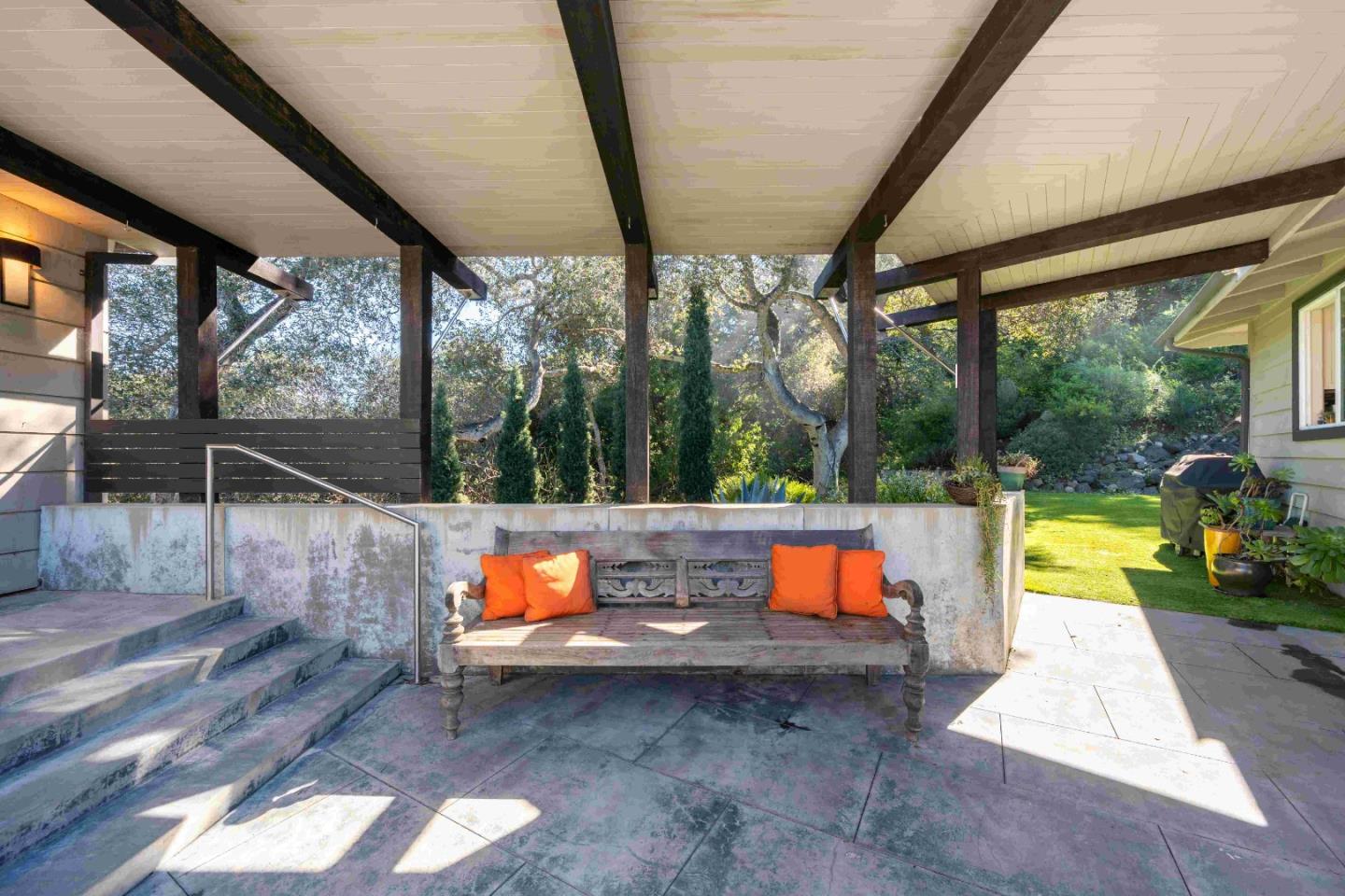 60 Los Ositos Road Carmel Valley, CA 93924 - Photo 22 of 47 a backyard of a house with outdoor seating