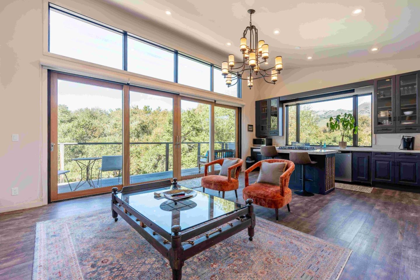 60 Los Ositos Road Carmel Valley, CA 93924 - Photo 26 of 47 a living room with furniture and a chandelier