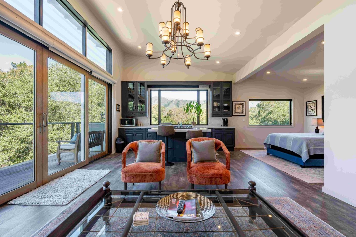 60 Los Ositos Road Carmel Valley, CA 93924 - Photo 27 of 47 a living room filled with furniture and a large window