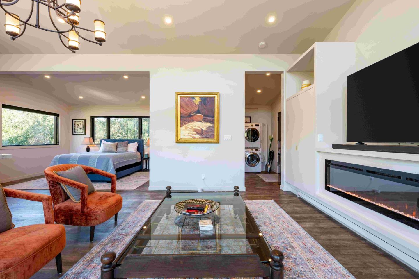 60 Los Ositos Road Carmel Valley, CA 93924 - Photo 28 of 47 a living room with furniture and a flat screen tv