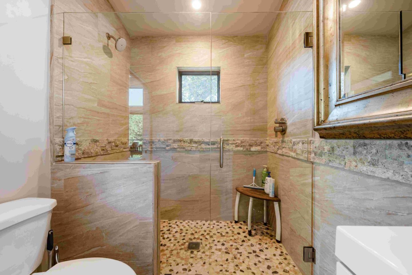 60 Los Ositos Road Carmel Valley, CA 93924 - Photo 30 of 47 a bathroom with a toilet sink and shower