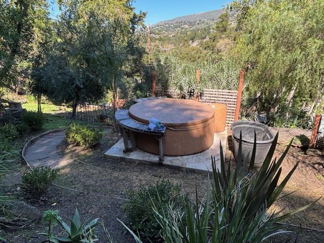 60 Los Ositos Road Carmel Valley, CA 93924 - Photo 36 of 47 a view of a backyard with sitting area