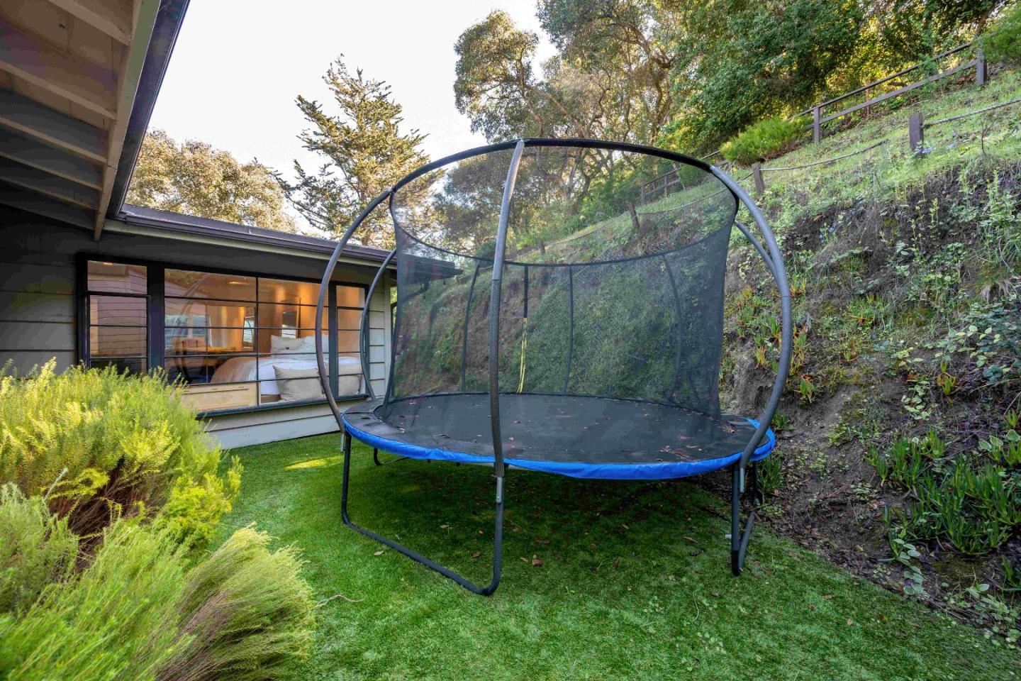 60 Los Ositos Road Carmel Valley, CA 93924 - Photo 37 of 47 a view of a chair in a backyard