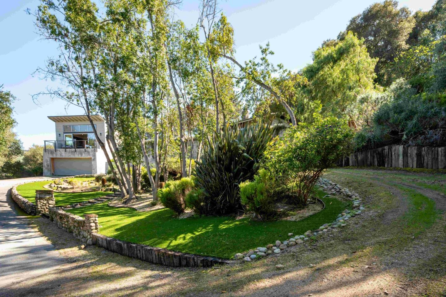 60 Los Ositos Road Carmel Valley, CA 93924 - Photo 41 of 47 a view of a house with a yard