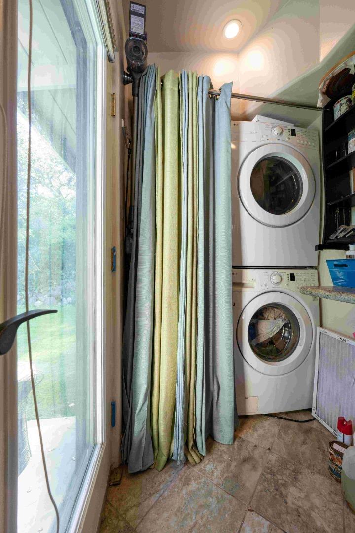 60 Los Ositos Road Carmel Valley, CA 93924 - Photo 9 of 47 a utility room with dryer and washer