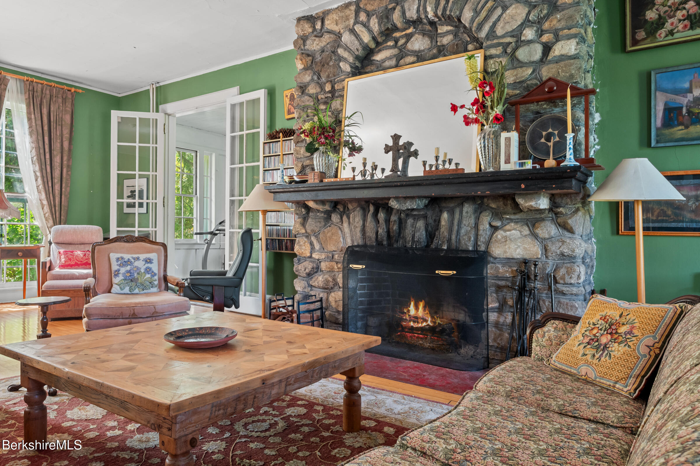 535 Main Road Monterey, MA 01245 - Photo 13 of 45 a living room with furniture and a fireplace