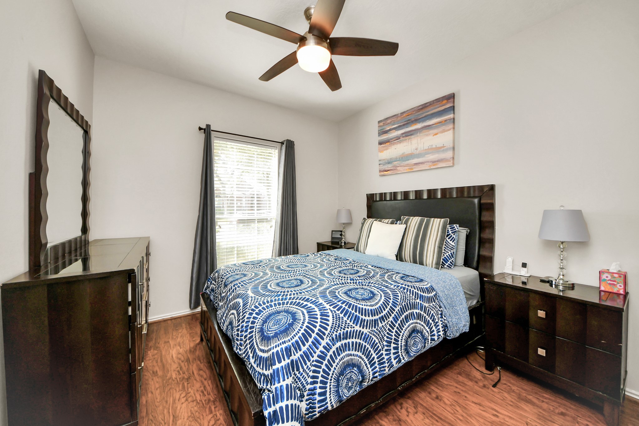 3515 Shadowside Court Houston, TX 77082 - Photo 14 of 31 a bedroom with a bed and a window