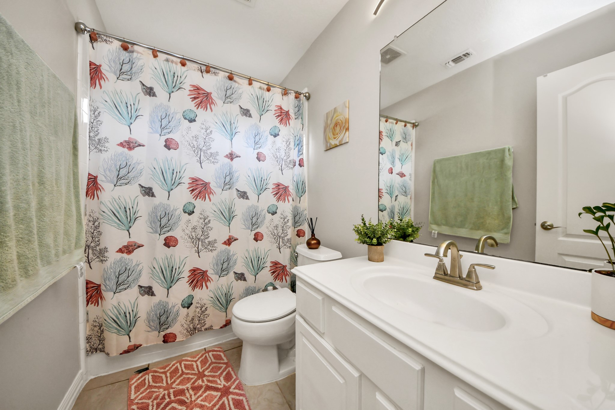 3515 Shadowside Court Houston, TX 77082 - Photo 24 of 31 a bathroom with a sink and a mirror