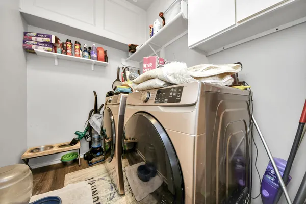 a utility room with dryer and washer