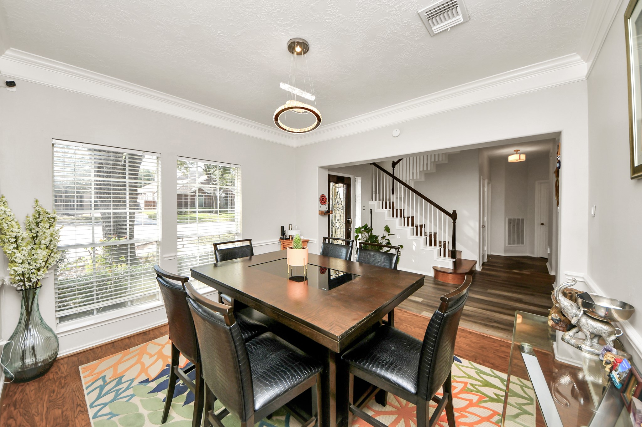 3515 Shadowside Court Houston, TX 77082 - Photo 5 of 31 a view of a dining room with furniture and wooden floor