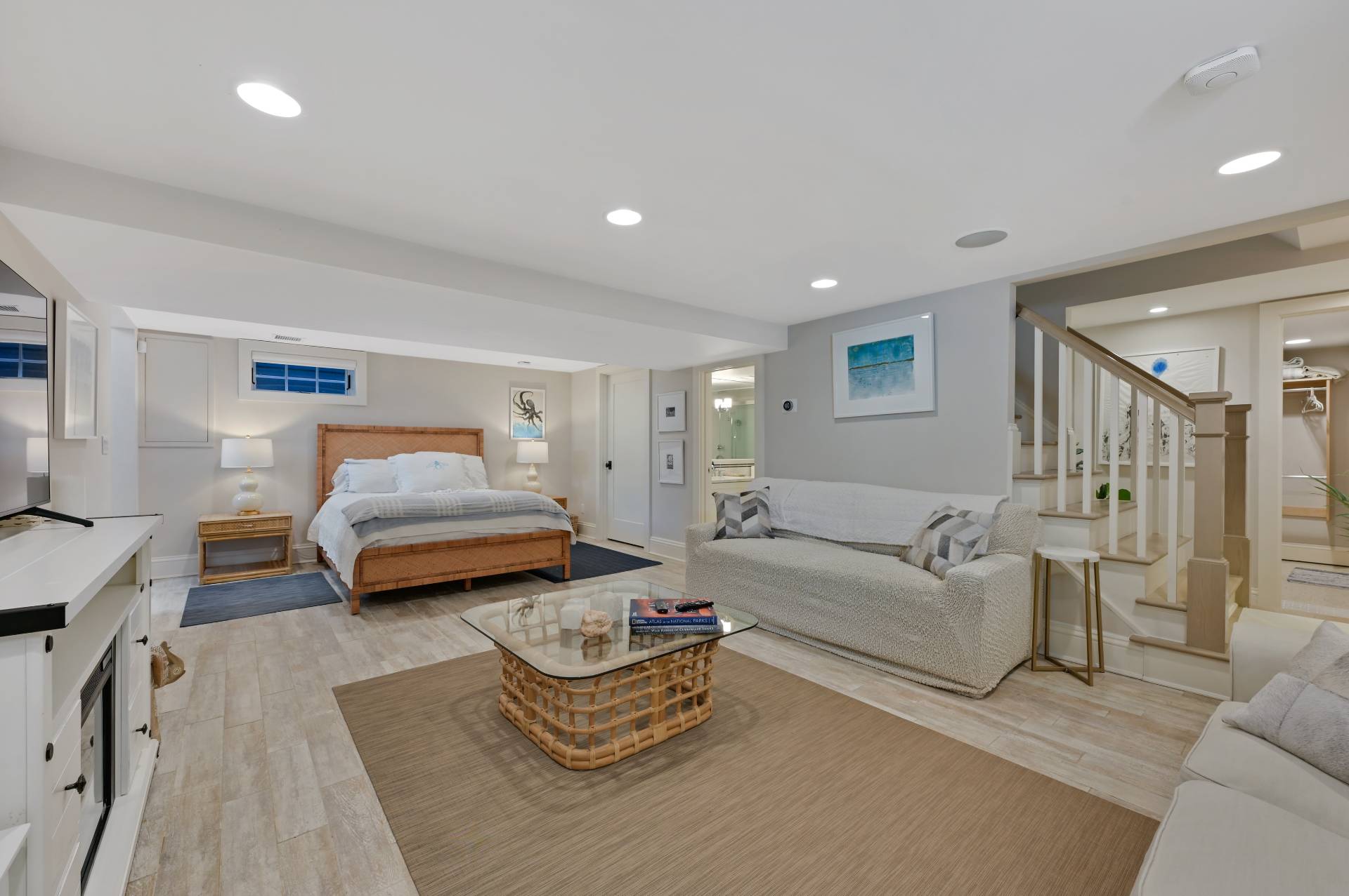 5 Ridge Drive Sag Harbor, NY 11963 - Photo 12 of 27 a bedroom with furniture and a couch