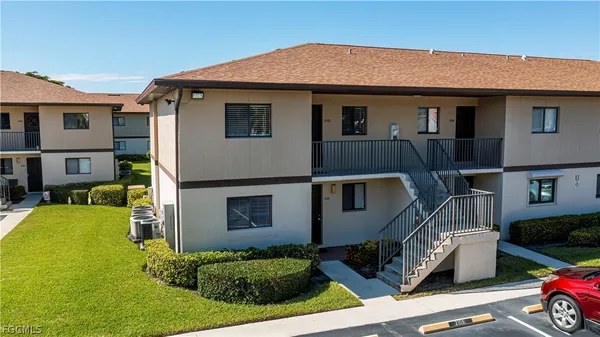 a car parked in front of a house