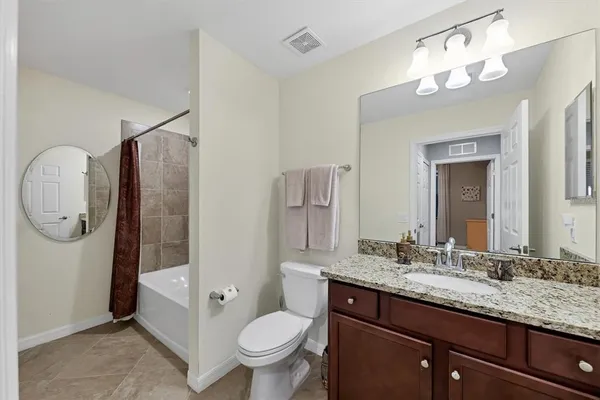 a view of a lake with a yard