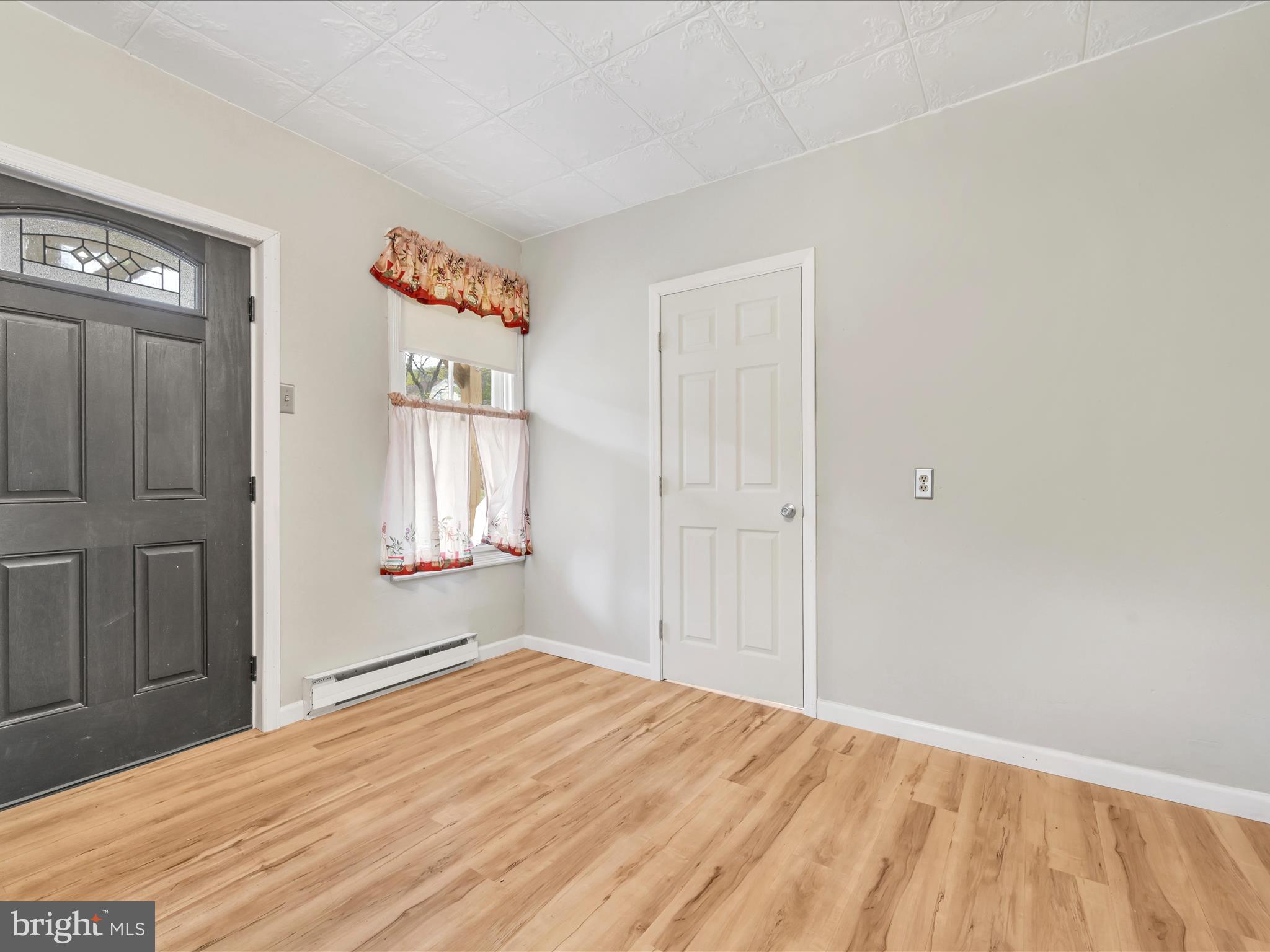 235 Biddle Street Gordon, PA 17921 - Photo 12 of 33 a big room with wooden floor closet and windows
