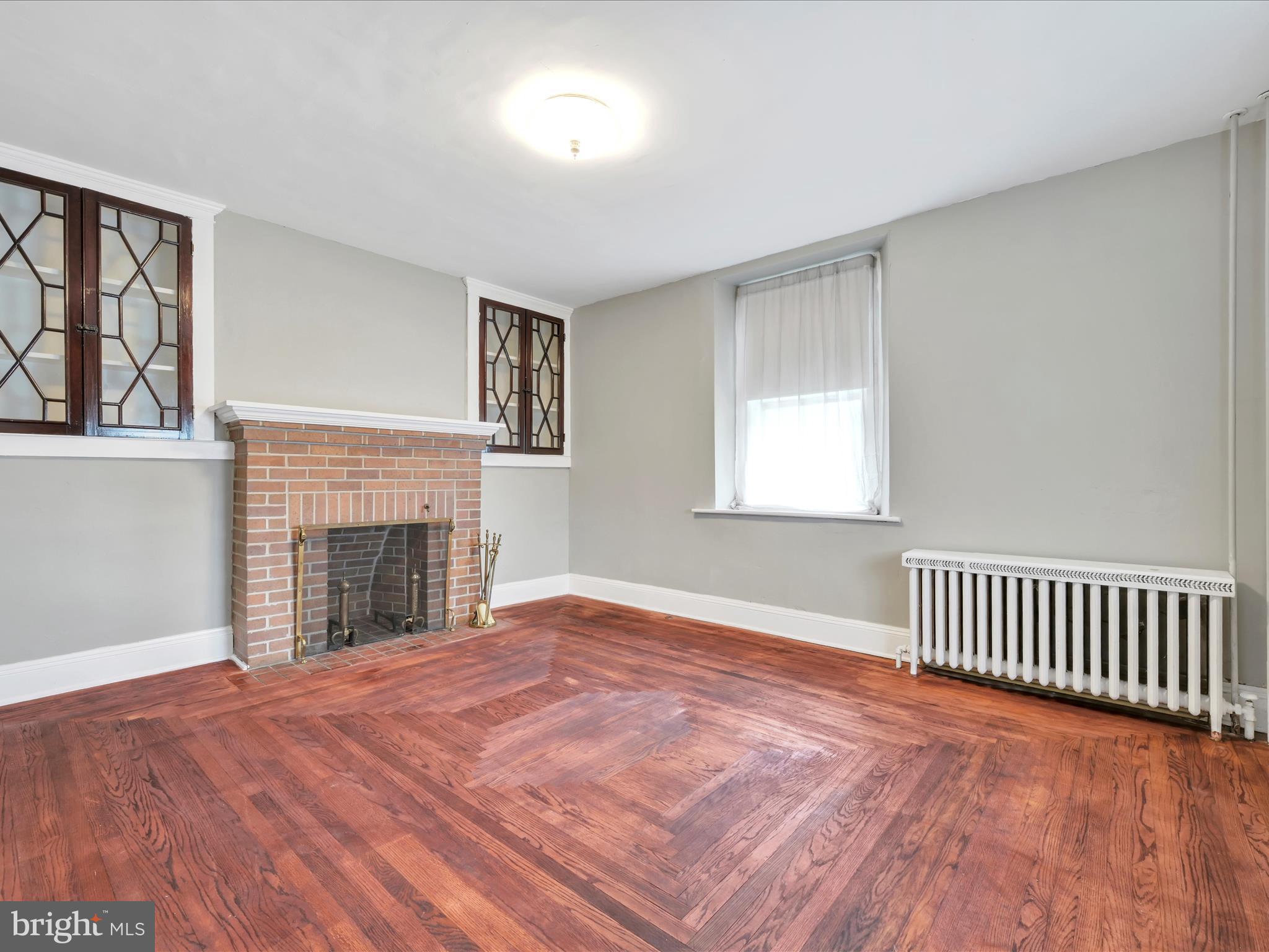 235 Biddle Street Gordon, PA 17921 - Photo 14 of 33 a view of an empty room with window and fireplace