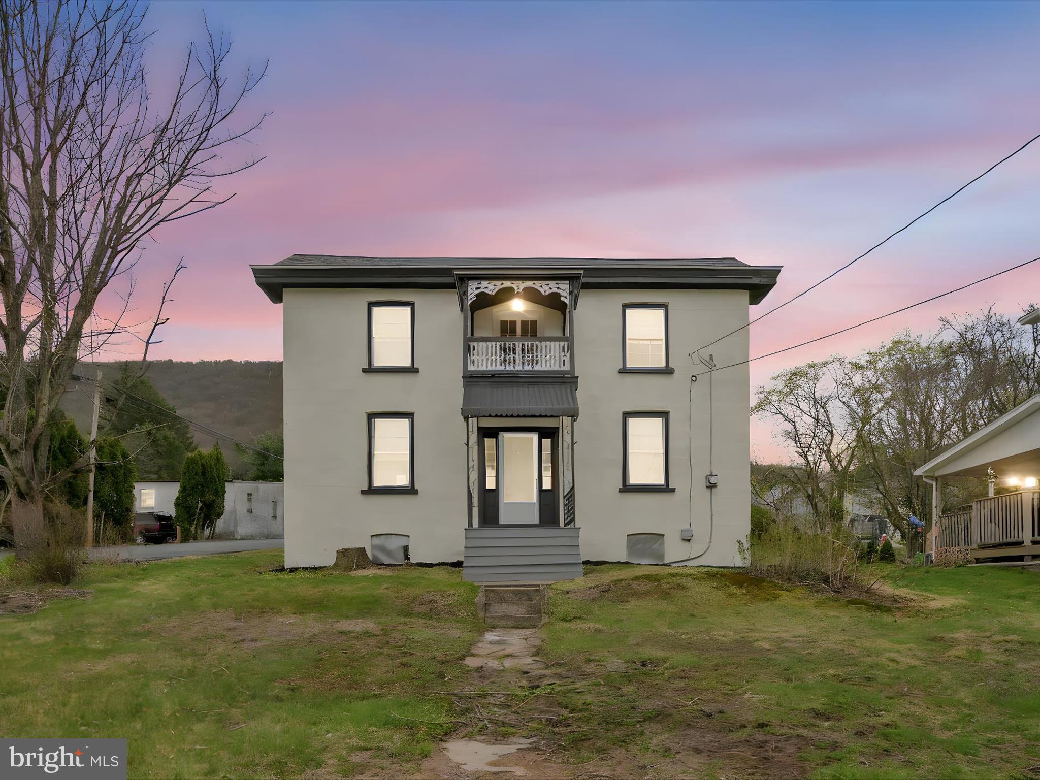 235 Biddle Street Gordon, PA 17921 - Photo 2 of 33 a front view of a house with a yard