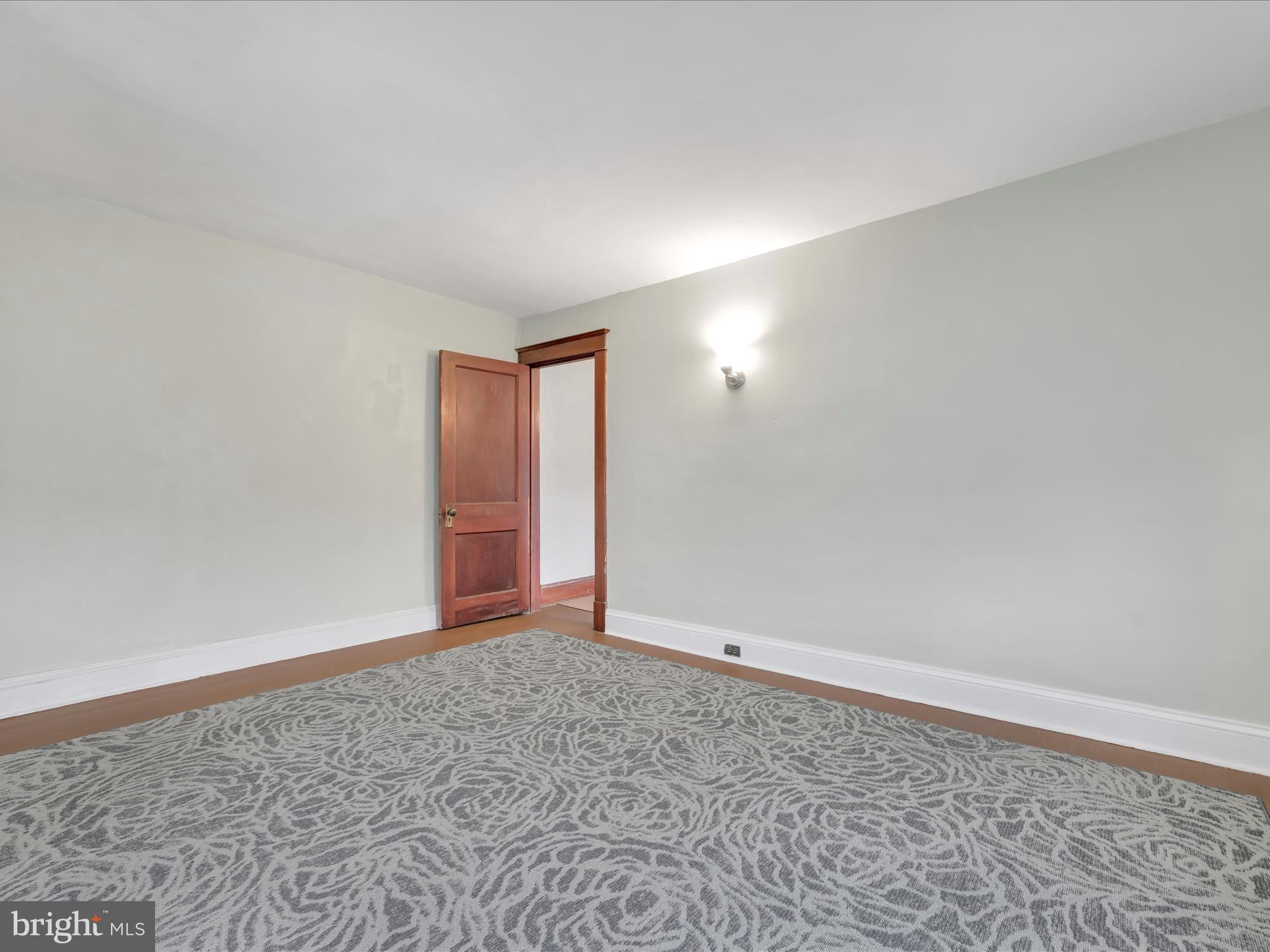 235 Biddle Street Gordon, PA 17921 - Photo 23 of 33 wooden floor in a empty room