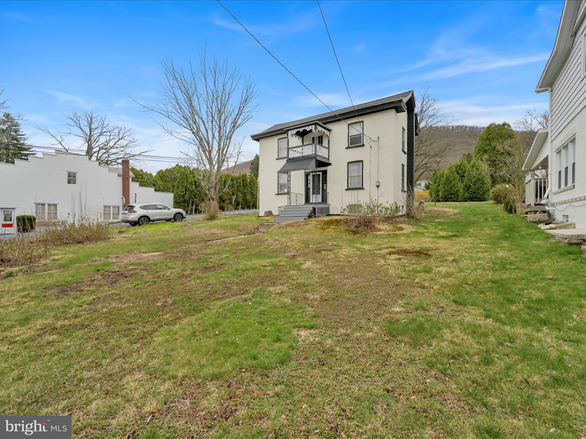 235 Biddle Street Gordon, PA 17921 - Photo 5 of 33 a view of a house with a yard
