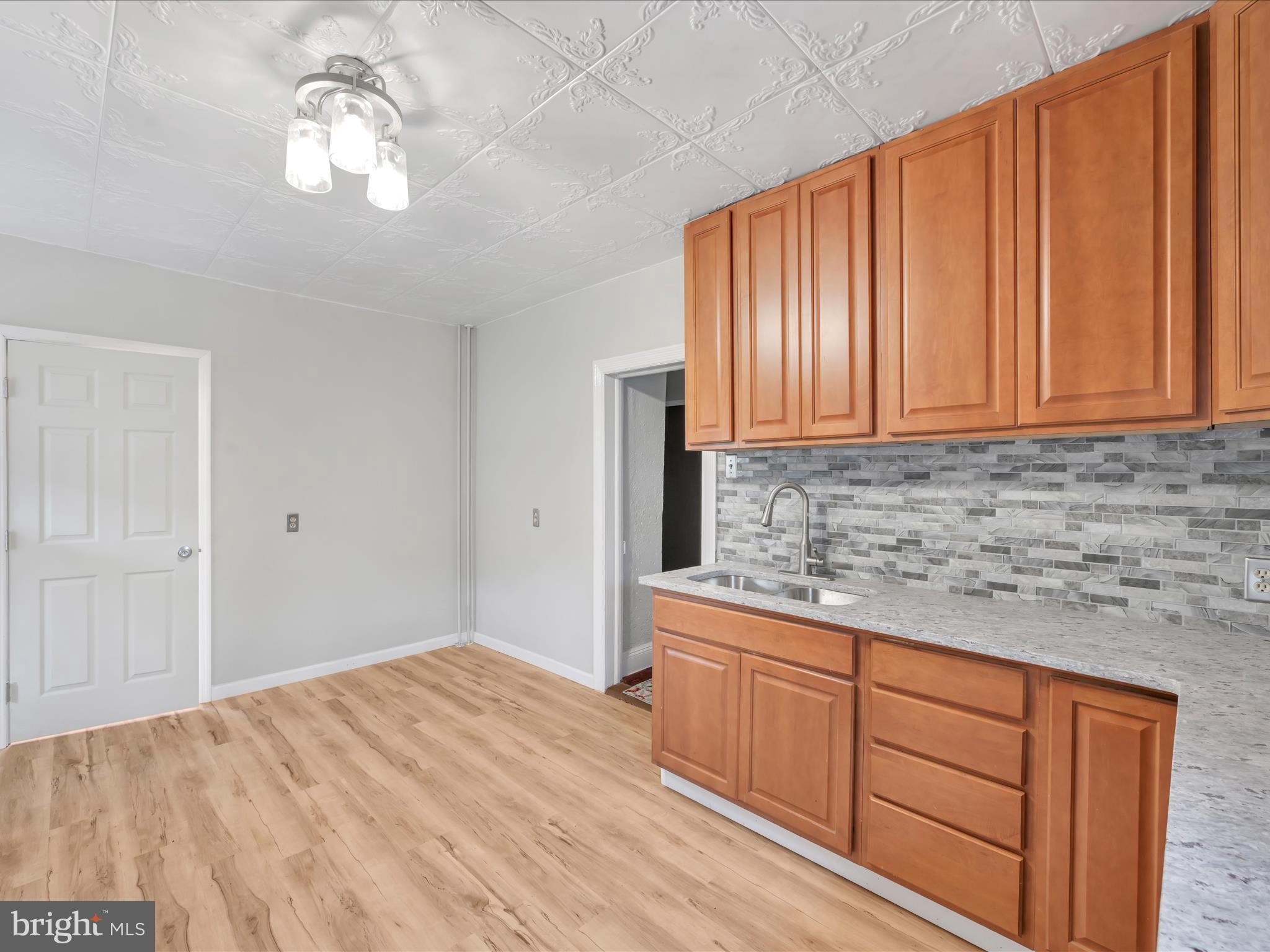 235 Biddle Street Gordon, PA 17921 - Photo 9 of 33 a bedroom with a bed cabinets and a window