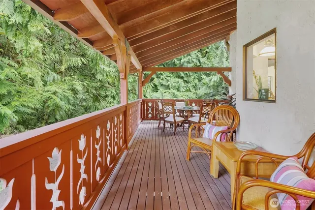 a view of balcony with furniture