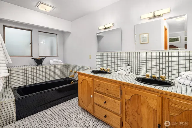 a bedroom with a bed and a cabinets