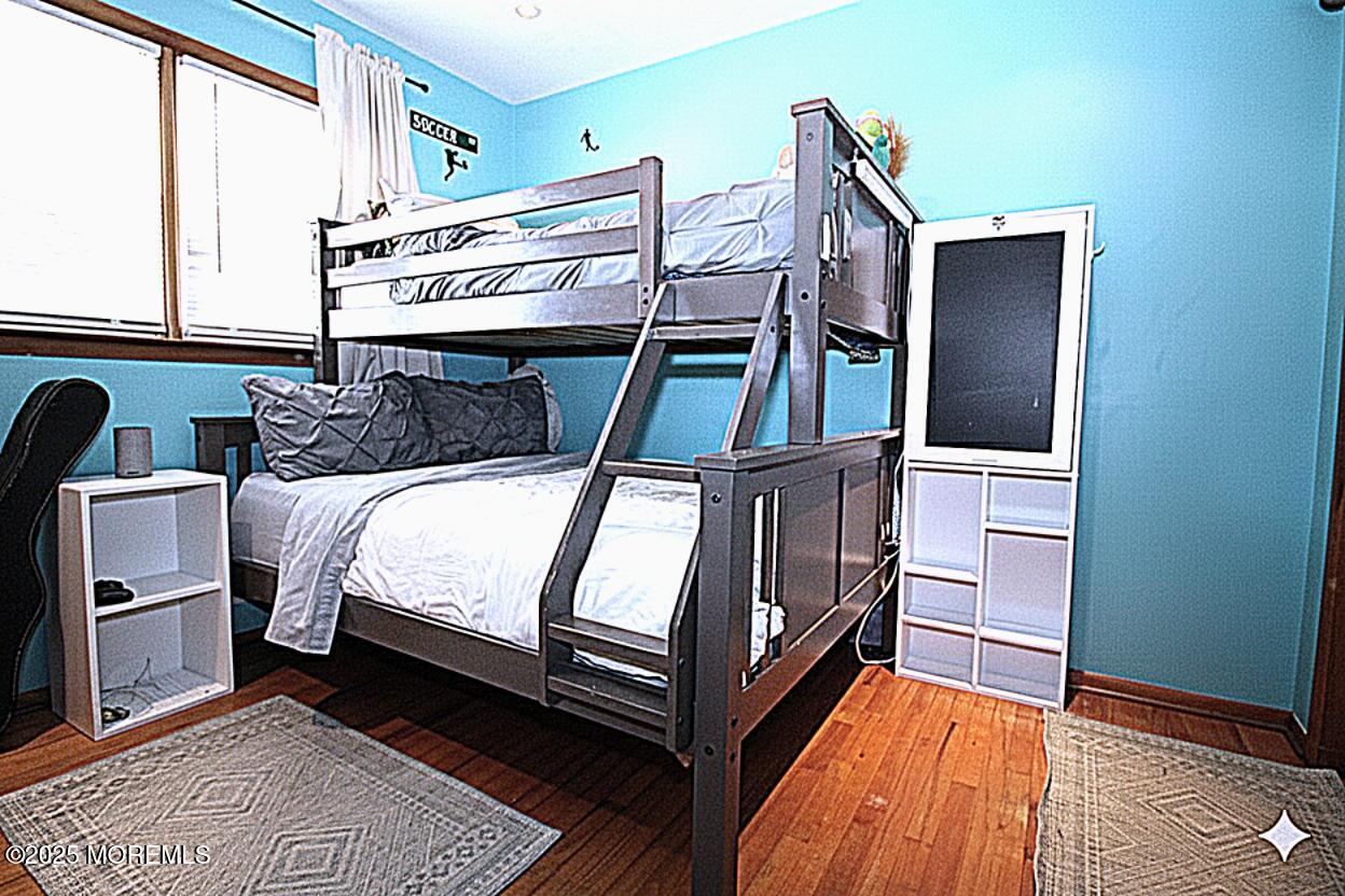 60 Shell Street Beachwood, NJ 08722 - Photo 14 of 24 a bed room with a bed and a window