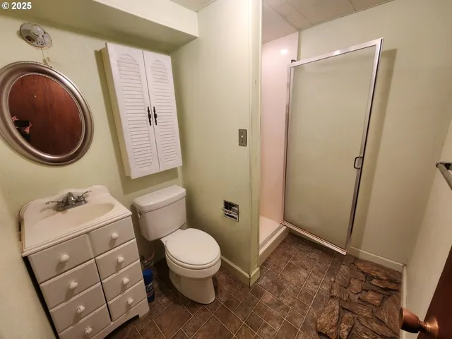 a bathroom with a toilet and a sink