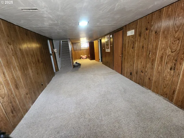 a view of hallway with stairs