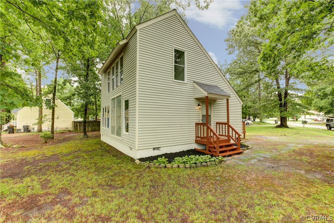 15820 Tri Gate Road Chester, VA 23831 - Photo 29 of 29 a view of a backyard with a garden and trees