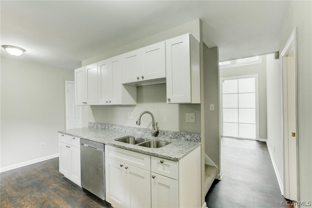 15820 Tri Gate Road Chester, VA 23831 - Photo 4 of 29 a kitchen with stainless steel appliances granite countertop a sink stove and cabinets