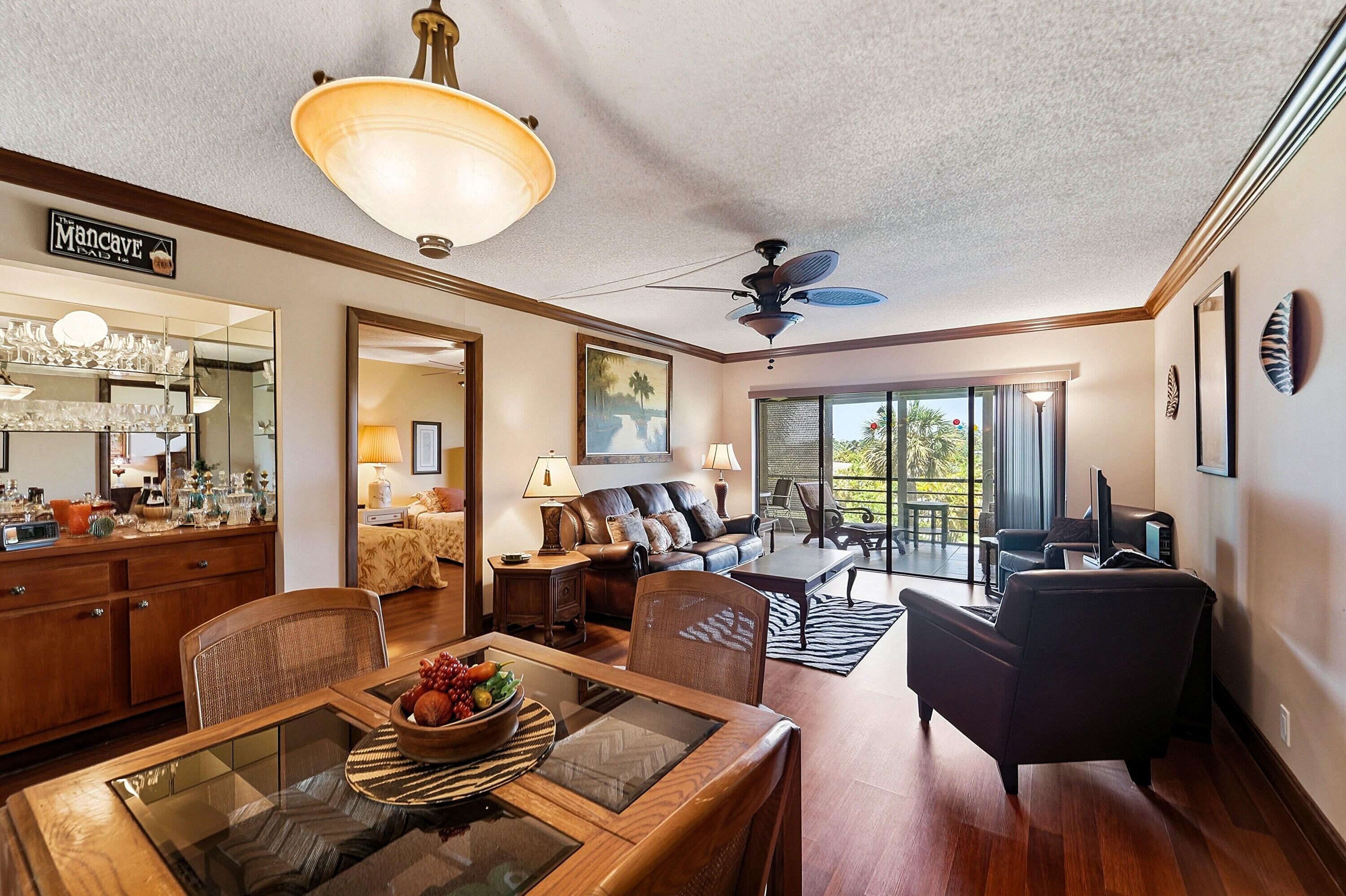 9273 Southwest 8th Street, Unit 321 Boca Raton, FL 33428 - Photo 4 of 29 Dining and Living Room
