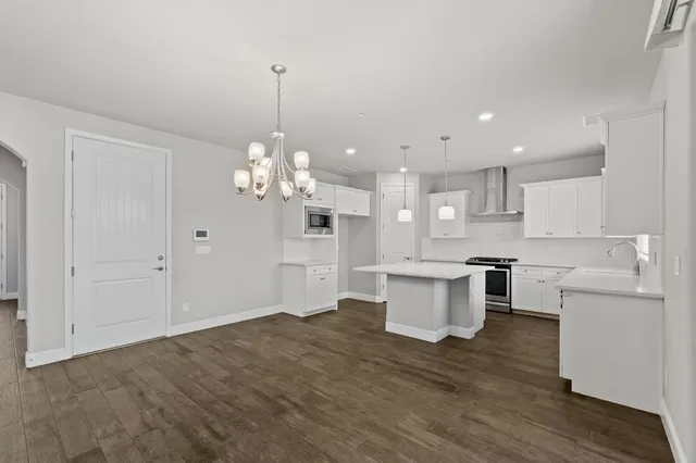 a view of a kitchen and a kitchen counter top space