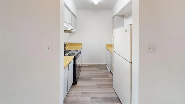 a view of hallway with stairs