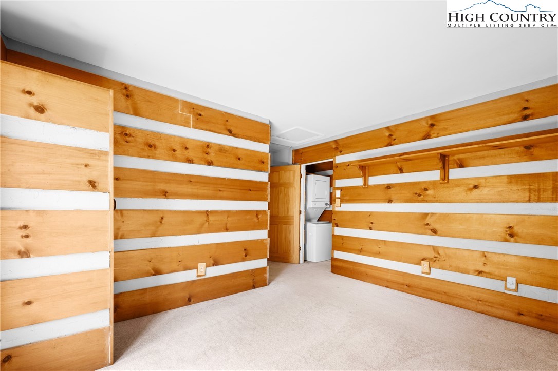 106 Sherry Lane, Unit 106 Boone, NC 28607 - Photo 11 of 27 a view of walk in closet with empty racks