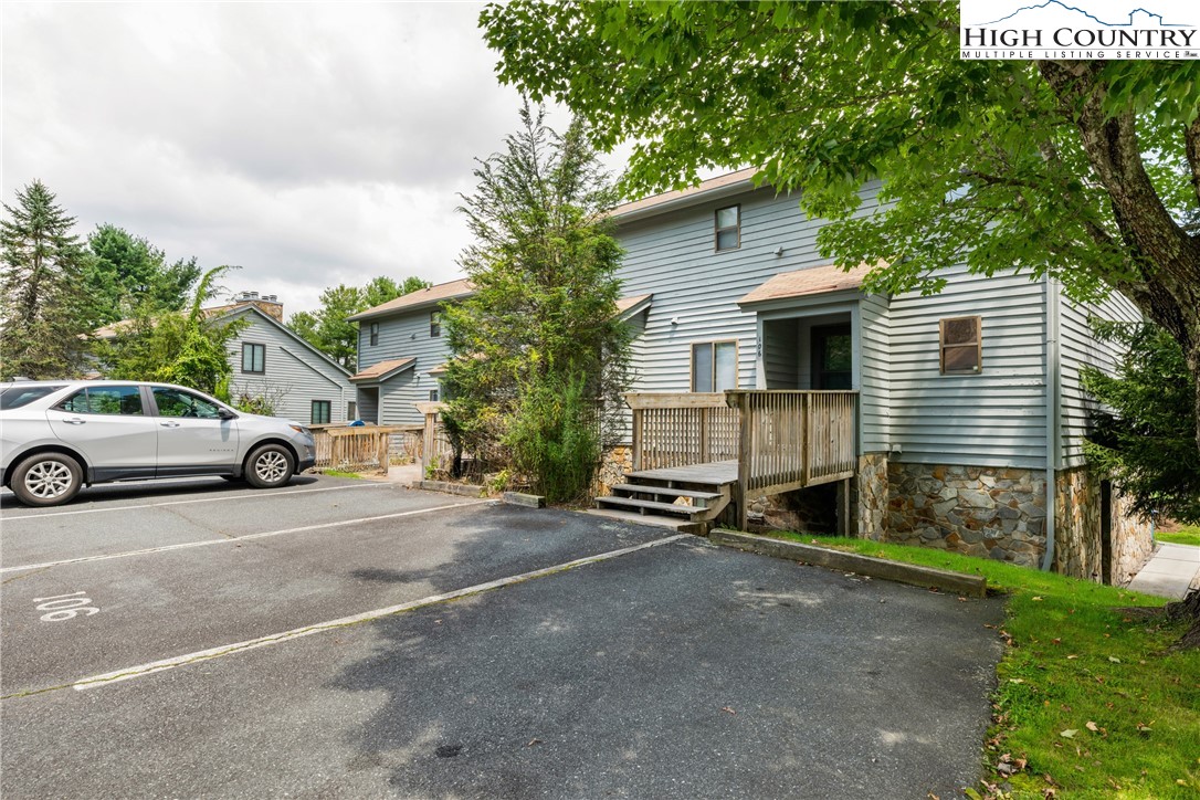 106 Sherry Lane, Unit 106 Boone, NC 28607 - Photo 19 of 27 a car parked in front of a house