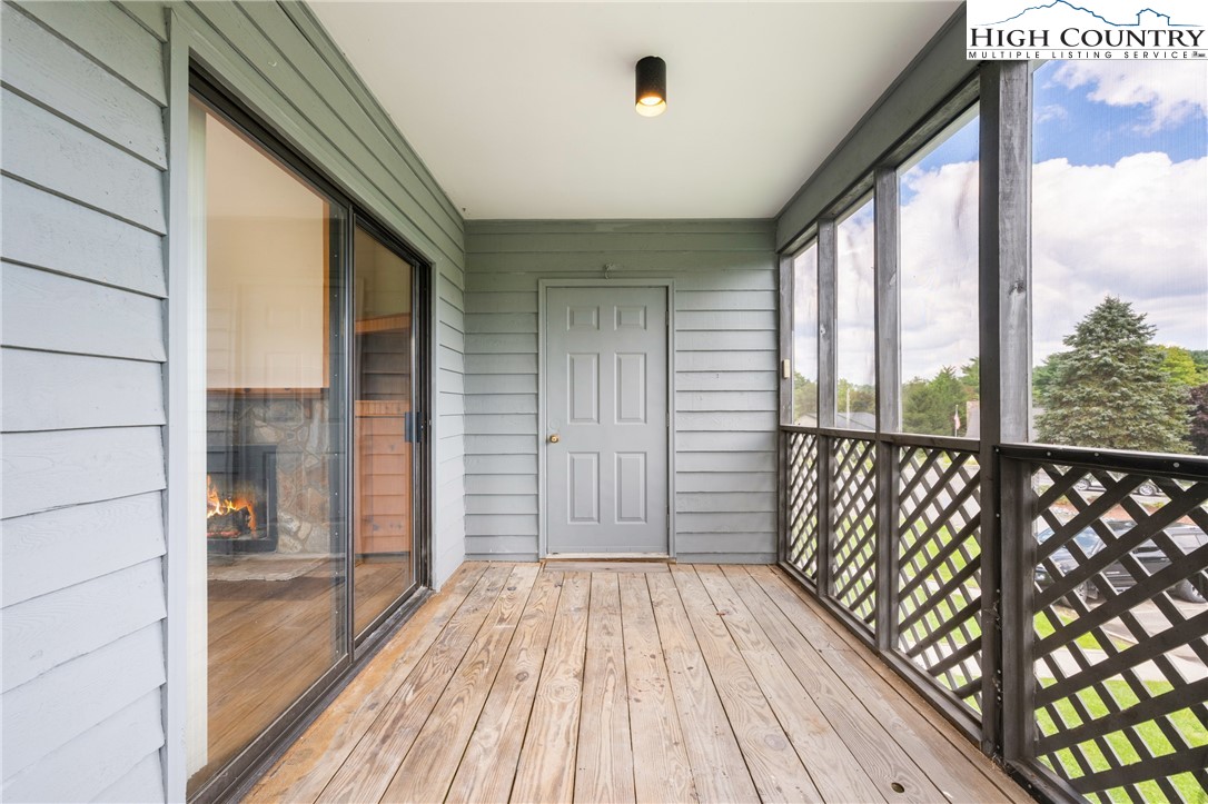 106 Sherry Lane, Unit 106 Boone, NC 28607 - Photo 21 of 27 a view of a balcony with wooden floor