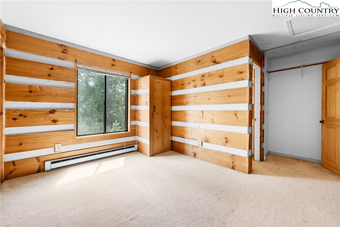 106 Sherry Lane, Unit 106 Boone, NC 28607 - Photo 10 of 27 a view of room with air conditioner and couch