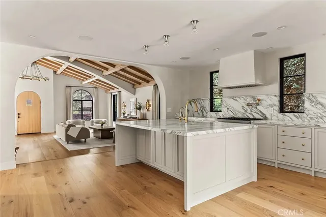 a table that has a table and a chandelier