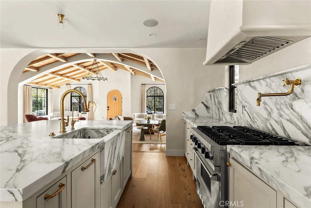738 San Lorenzo Street Santa Monica, CA 90402 - Photo 13 of 50 a kitchen with a sink and stove