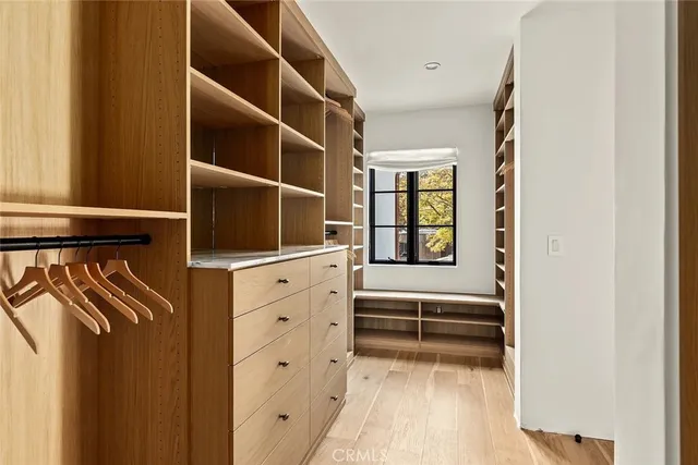 a white bath tub sitting next to a white toilet