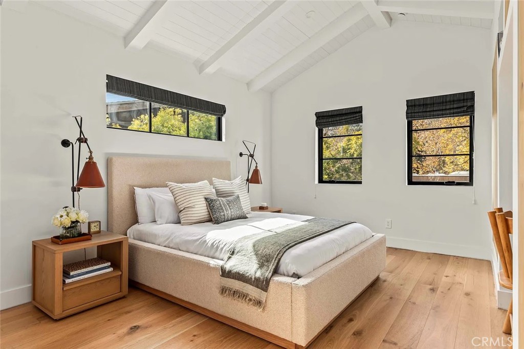 738 San Lorenzo Street Santa Monica, CA 90402 - Photo 35 of 50 a bedroom with a bed and a flat screen tv