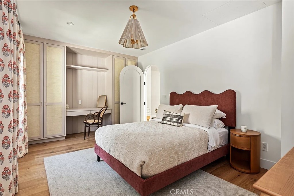 738 San Lorenzo Street Santa Monica, CA 90402 - Photo 40 of 50 a bedroom with a bed a lamp and a window